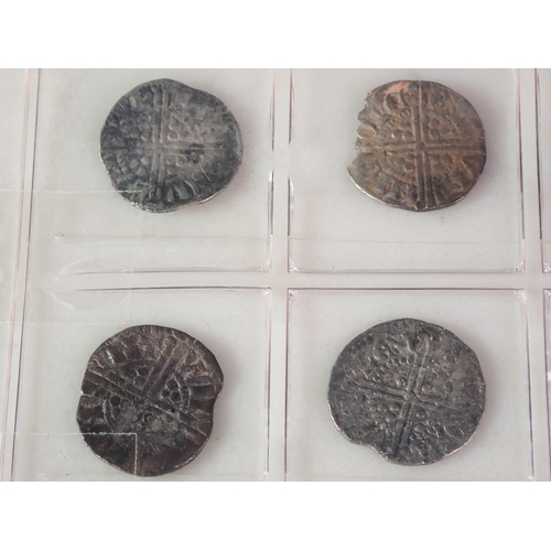 129 - A collection of twenty one long and short cross hammered silver Coins, to income Henry III void long... 