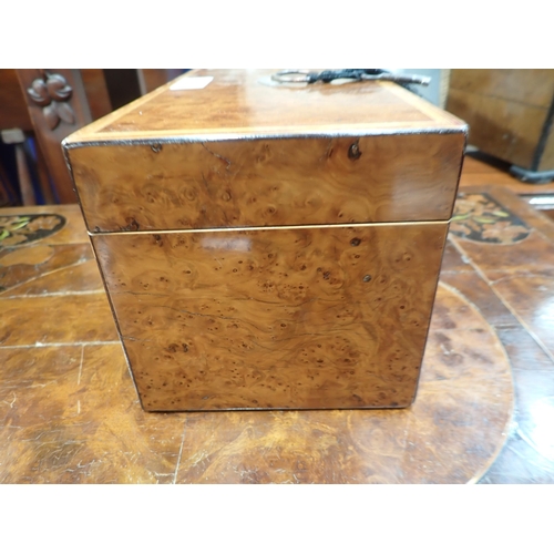 695 - A Georgian burr yew Tea Caddy with satinwood stringing, two interior lidded Boxes, 12in