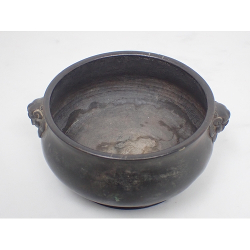 400 - A Chinese bronze small Censor with mask handles, 5in diam, six character mark under