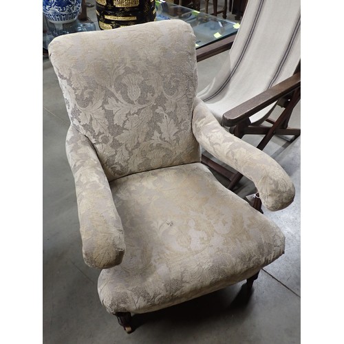 628 - A 19th Century Gillow Armchair with scrolled back and arms, stamped 'Gillow 3029', one replaced back... 