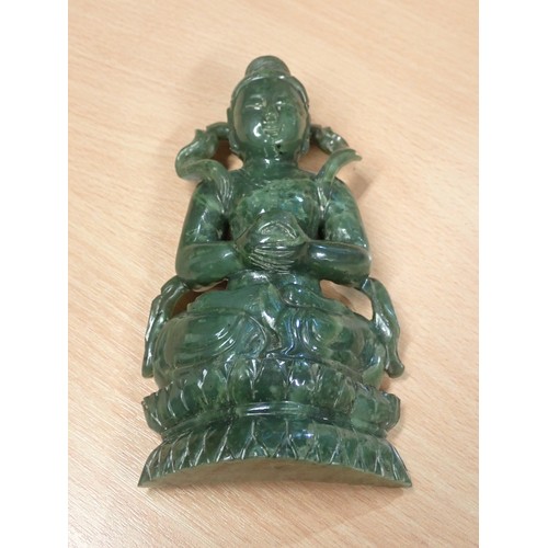 402 - A carved greenstone Figure of a Buddha on carved wooden stand 6in H, an Eastern carved stone Figure ... 