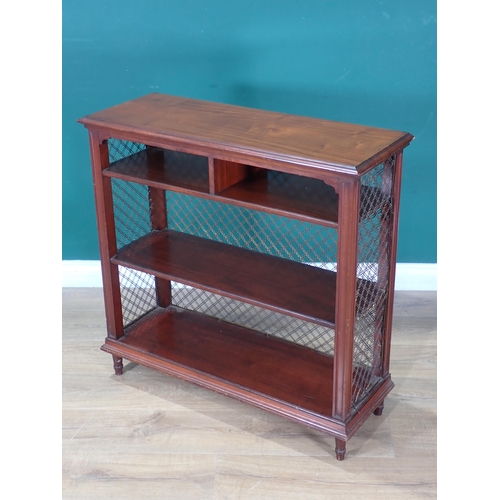 483 - A Regency mahogany Bookcase with wirework lattice ends and fixed shelves on turned supports 2ft 8in ... 