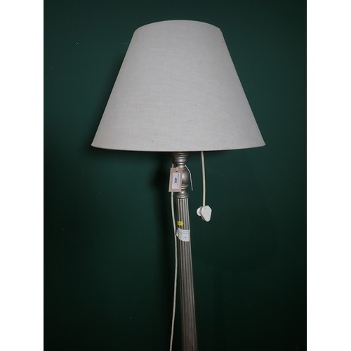 438 - A silver painted Standard Lamp ( Failed PAT Test)and shade and a quantity of Lampshades