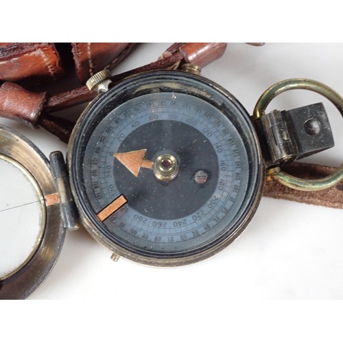 435 - A Military issue Pocket Compass, in original leather case