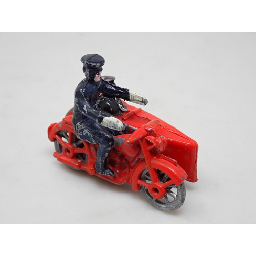 243 - An early English diecast Model of a Motorcycle and Sidecart