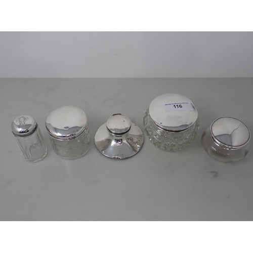 116 - A small silver Capstan Inkwell and four silver lidded glass Jars