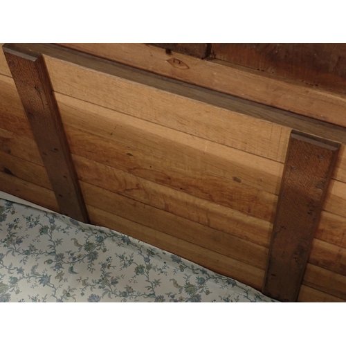 13 - An antique oak and elm Coffer with four panelled top and panelled top on squared supports, 5ft W