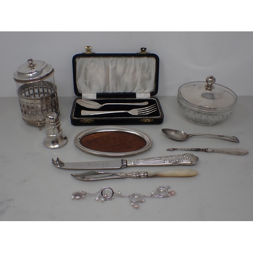 134 - A silver Christening Spoon and Fork, in case, a silver lidded Powder Jar and Preserve Jar, a Butter ... 