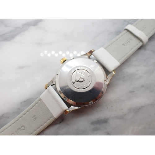 153 - A gentleman's Omega Constellation Automatic Wristwatch the silvered dial with hourly baton markers, ... 