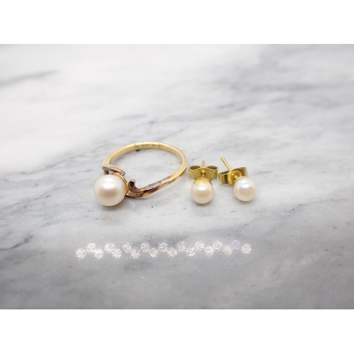 164 - A cultured Pearl Ring stamped 14K and a pair of cultured Pearl Ear Studs on 9ct gold mounts, approx ... 