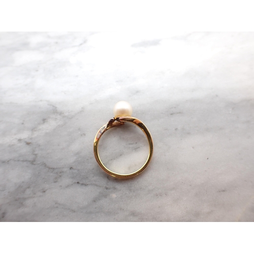 164 - A cultured Pearl Ring stamped 14K and a pair of cultured Pearl Ear Studs on 9ct gold mounts, approx ... 