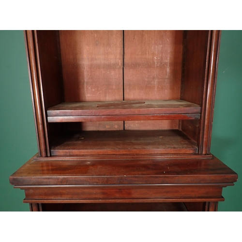 17 - A tall narrow mahogany two section open Bookcase with adjustable shelves and plinth base, 7ft 5in H