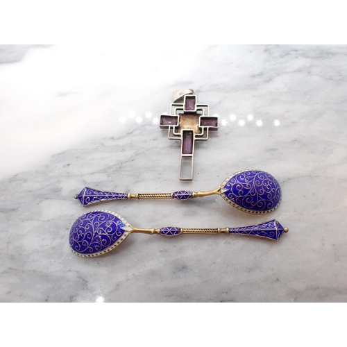 195 - A silver Pendant Cross set purple stones and a pair of gilt and blue enamel Condiment Spoons