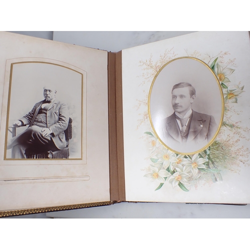 221 - A Victorian Photograph Album with embossed cover containing family portraits, etc, and a smaller Alb... 