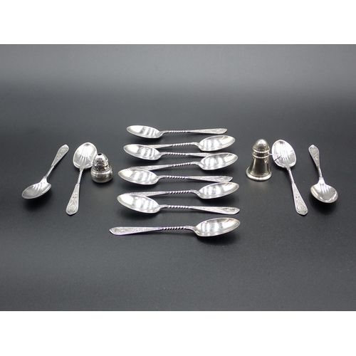 242 - A set of twelve Victorian silver Teaspoons, Sheffield 1898 and two silver Pepperettes