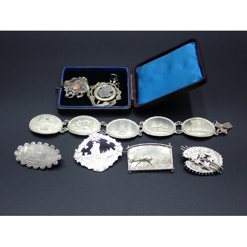 254 - A collection of Victorian/Edwardian silver Jewellery and fobs etc. To include a Brooch depicting Sto... 