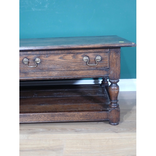 27 - An oak Coffee Table fitted two drawers, 1ft 6