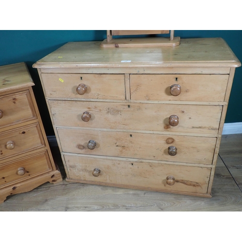 306 - An antique pine Chest of two short and three long drawers, 3ft 3in W x 2ft 10in H, a pine Desk and a... 