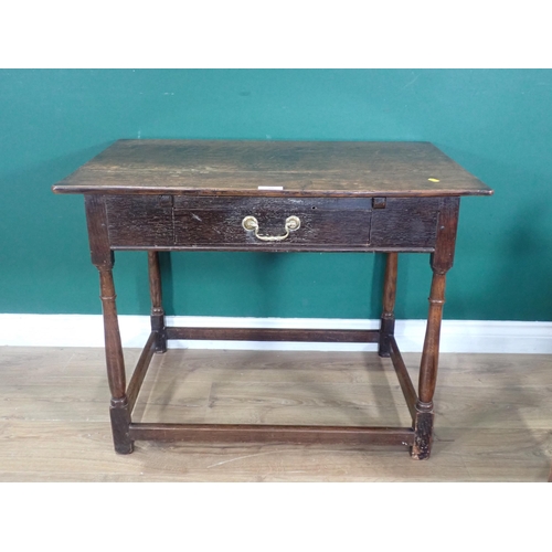 308 - An antique oak Side Table fitted frieze drawer on turned supports and squared stretchers, 2ft 9in W,... 