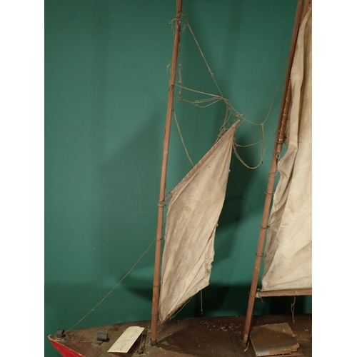 31 - *WITHDRAWN***A Pond Yacht on stand with two sails, 3ft 4in L A/F