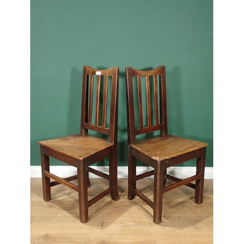 33 - A pair of antique oak Country stick back Kitchen Chairs