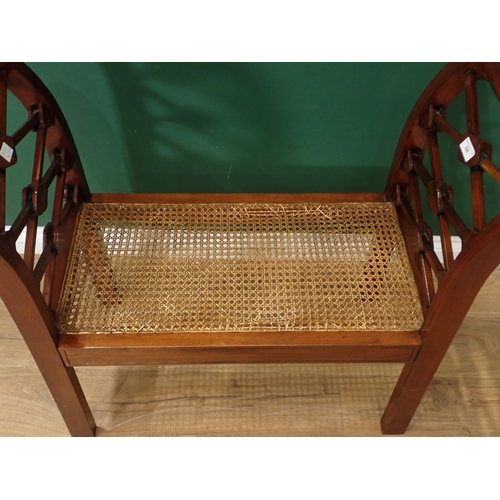 338 - A reproduction mahogany Window Seat, with cane work seat