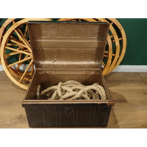 351 - A metal Trunk containing a gun carriage type Rope and six Cart Wheels