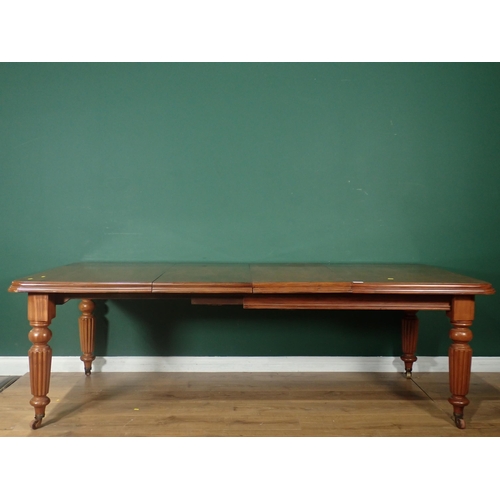 357 - A Victorian extending Dining Table with moulded rectangular top on reeded tapering supports and cast... 