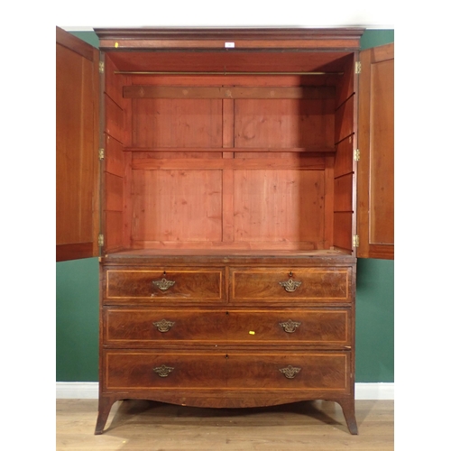 366 - A 19th Century mahogany Linen Press with ebonised and satinwood crossbanding having a pair of panell... 