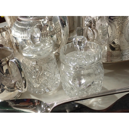 373 - A quantity of plated items including two Biscuit Barrels, teapot, Goblets etc