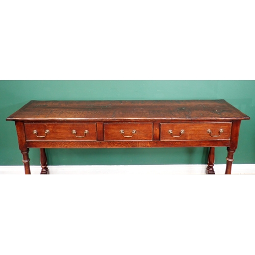 388 - A reproduction Georgian style Dresser Base fitted three frieze drawers on turned supports and square... 