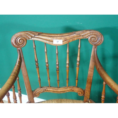 47 - ***WITHDRAWN***A carved Elbow Chair with cane seat and a simulated bamboo Elbow Chair