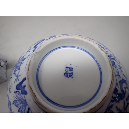 51 - A Chinese blue and white Bowl, the interior decorated figure, bird and deer within circular reserves... 