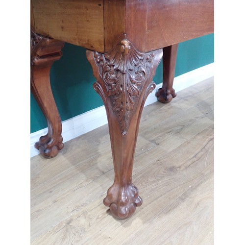 40 - A 19th Century walnut Side Table mounted upon carved cabriole supports and claw and ball feet 2ft 10... 