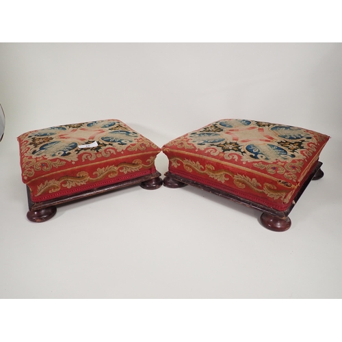 66 - A pair of Victorian square Footstools with floral woolwork tops on turned feet, 13in square