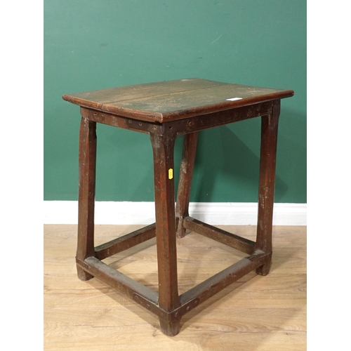 716 - An antique oak Side table with rectangular top on chamfered supports and squared stretchers, 1ft 10i... 