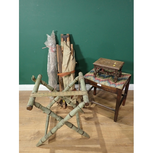 720 - A painted Luggage Stand, a folding Camp Bed, a tapestry Frame, a small carved Stool and a Dressing S... 