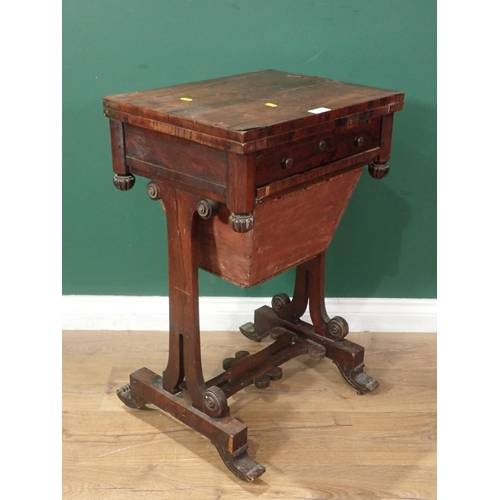 731 - A rosewood Writing/Work Table with fold-over rotating top, fitted frieze drawer and solid basket bel... 