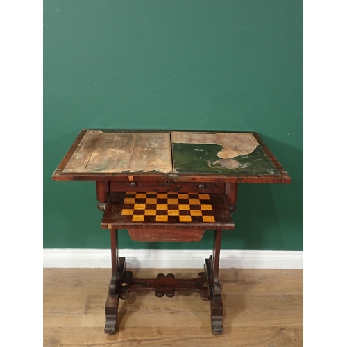 731 - A rosewood Writing/Work Table with fold-over rotating top, fitted frieze drawer and solid basket bel... 