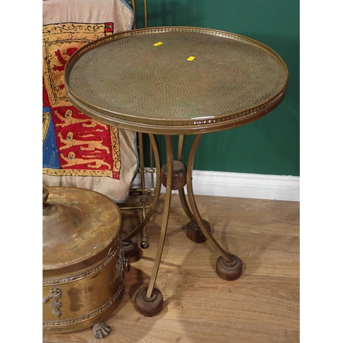 737 - An oval brass Coal Box, a brass Fire Screen, a brass top Table, a Spear, a dog head Staff and a stee... 