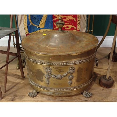 737 - An oval brass Coal Box, a brass Fire Screen, a brass top Table, a Spear, a dog head Staff and a stee... 