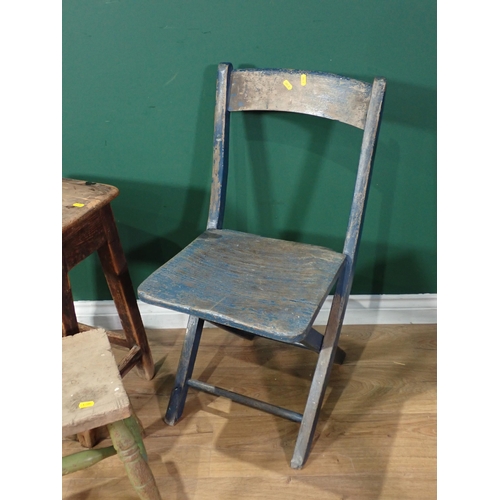 738 - A blue painted folding wooden Chair, a Stool, a green painted rustic Stool, and a triangular Table