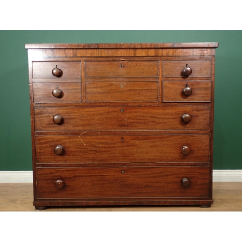 8 - A 19th Century mahogany Chest with two deep and two small drawers above three long drawers on bun fe... 