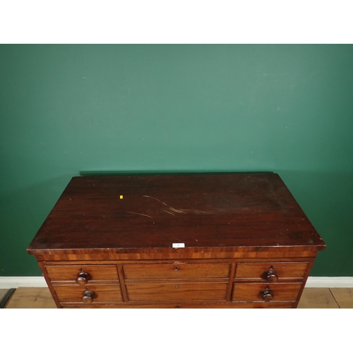 8 - A 19th Century mahogany Chest with two deep and two small drawers above three long drawers on bun fe... 