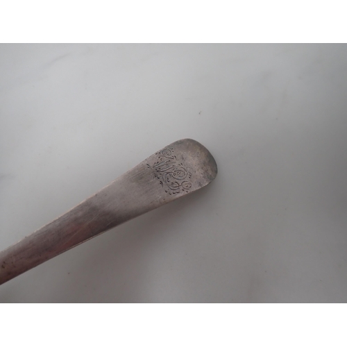 90 - A George III silver Basting Spoon, old English pattern, engraved initials, London 1782