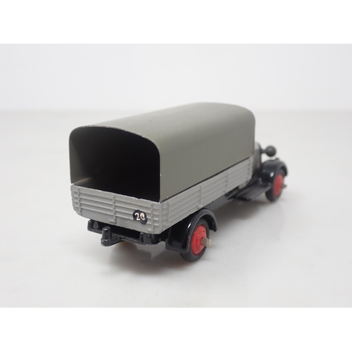 124 - A Dinky Toys 25B/4 grey Covered Wagon with red hubs