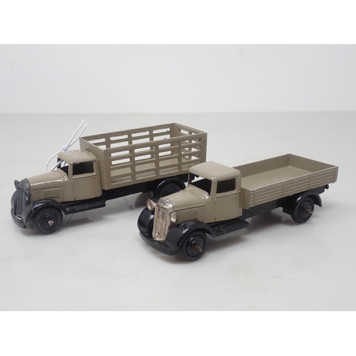 125 - A Dinky Toys 25F stone coloured Market Garden Wagon and a 25A stone coloured Wagon