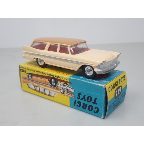 128 - A boxed Corgi Toys No.219 Plymouth Sports Suburban