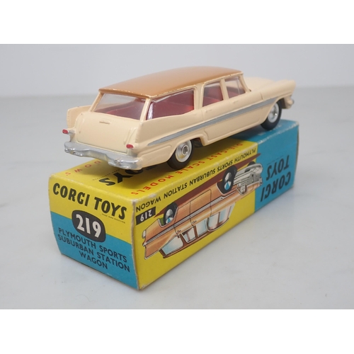 128 - A boxed Corgi Toys No.219 Plymouth Sports Suburban