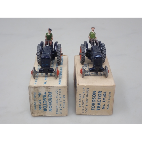 135 - Two boxed  Britains Lilliput World LV/604 Fordson Tractors ex-shop stock